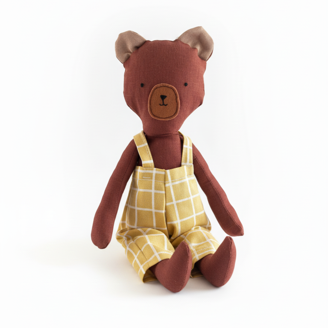 Adorable 13-inch brown bear for kids 1 year & above, dressed in chrome yellow checkered pants. Gender-neutral, soft, durable, and perfect for playtime or travel. Soft fabric toy, safe for kids, perfect toddler gift & keepsake for birthdays. Gift ideas for children. cloth doll for children.