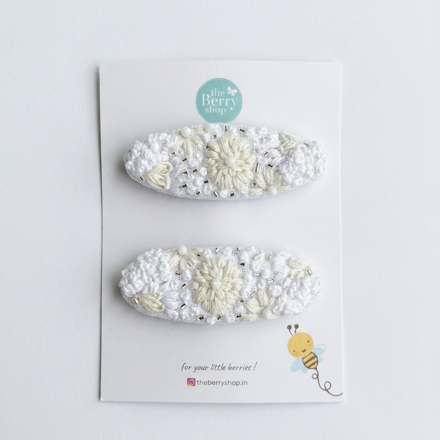 Moonflower Embroidered oval snap Clip