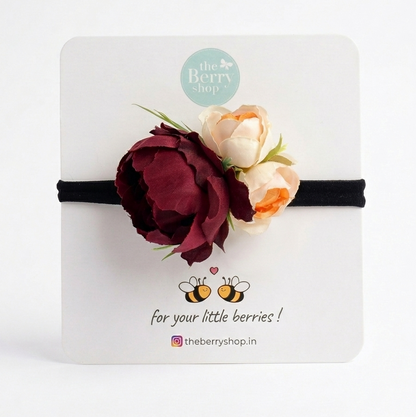 Burgundy and cream floral baby headband with soft elastic band for baby girls.