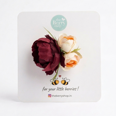 Burgundy and cream floral baby headband with soft elastic band for baby girls.