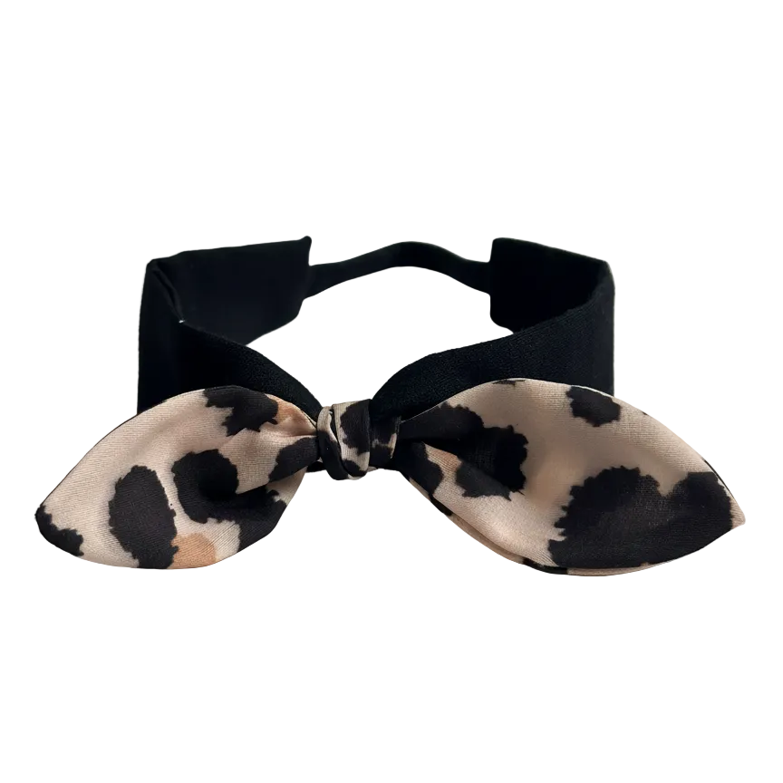 Black baby headband with beige and black leopard print knot bow for toddler girls.