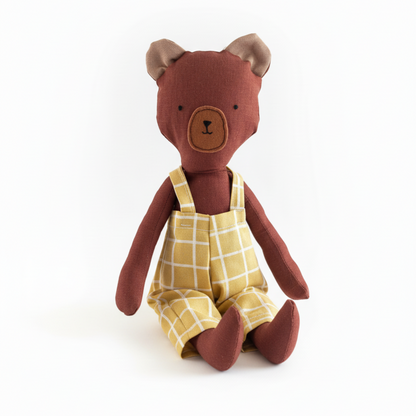 Adorable 13-inch brown bear for kids 1 year & above, dressed in chrome yellow checkered pants. Gender-neutral, soft, durable, and perfect for playtime or travel.  Soft fabric toy, safe for kids, perfect toddler gift & keepsake for birthdays. Gift ideas for children. cloth doll for children.
