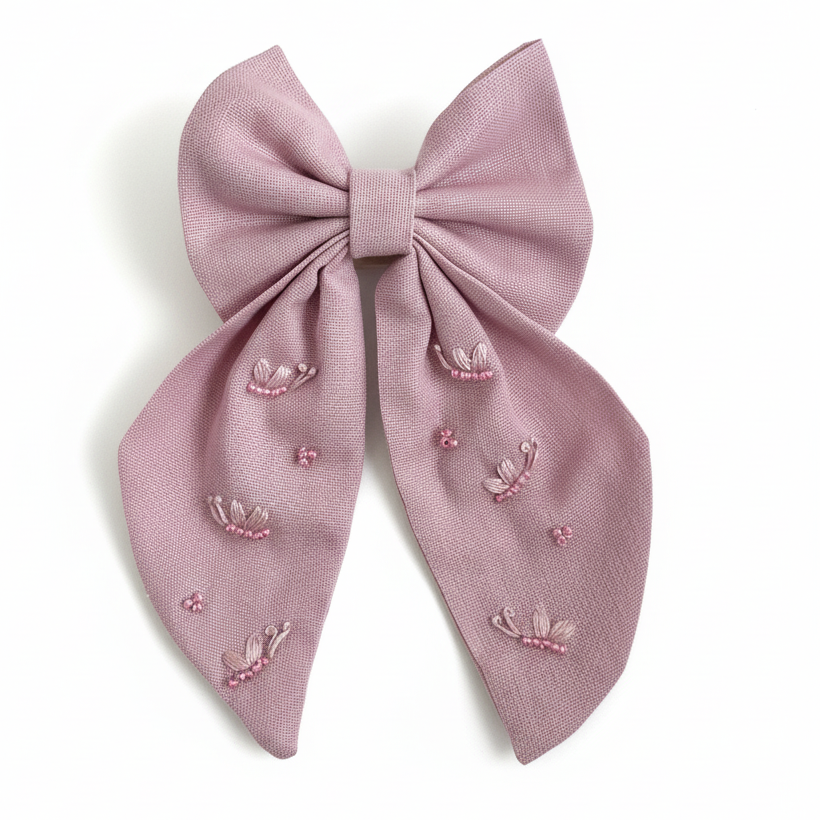 handmade mauve bow clip, embroidered hair bow for girls, long tail linen bow, baby girl hair accessories, pink bow for kids, elegant handmade bow, toddler hair clip, floral embroidered bow, special occasion bow for girls, baby boutique accessories