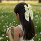 yellow daisy hair bow, embroidered hair clip for girls, handmade long tail bow, floral baby hair accessory, pastel yellow hair bow, cute summer bow for kids, embroidered daisy bow clip, boutique baby bow